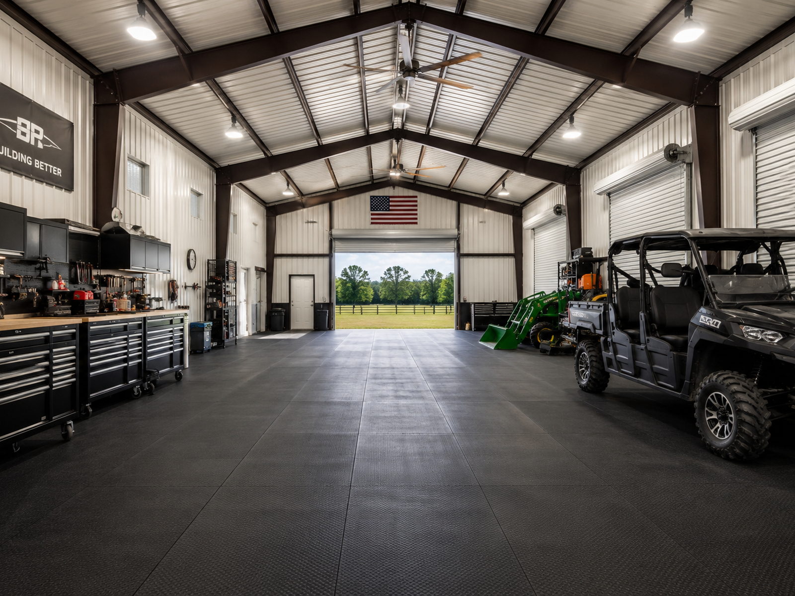 Interior of a custom metal barn with rubber-surfaced aisle